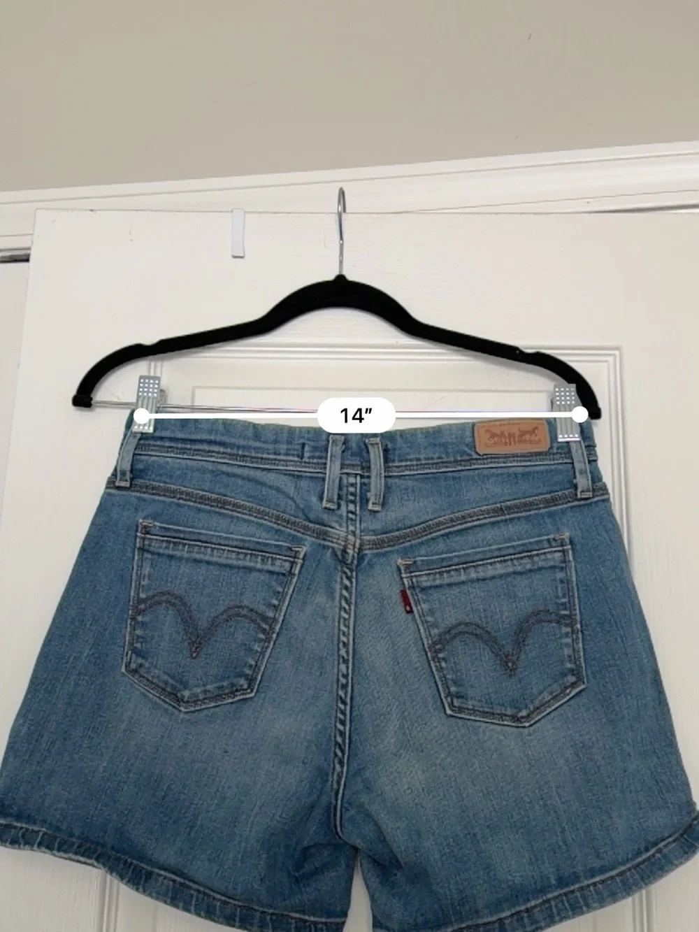 Levi's blue classic mid length denim shorts size 4